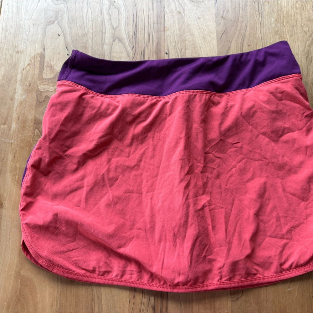 Lucy Running Tennis Skort, purple and orange size S